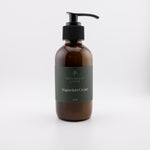 Bottle with pump of Naturally Linda Magnesium Cream with white background