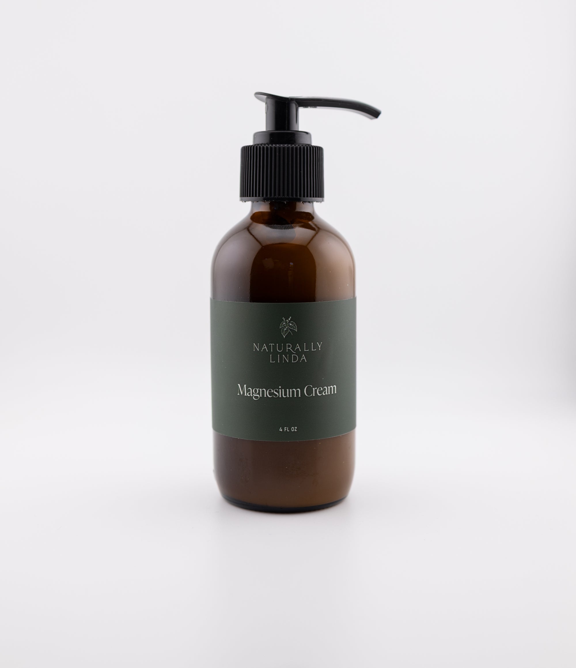 Bottle with pump of Naturally Linda Magnesium Cream with white background