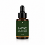 A 1 fl oz amber glass dropper bottle of Naturally Linda Batana+ Hair Growth Oil, featuring a dark green label with white text and a black dropper cap, set against a light gray background.