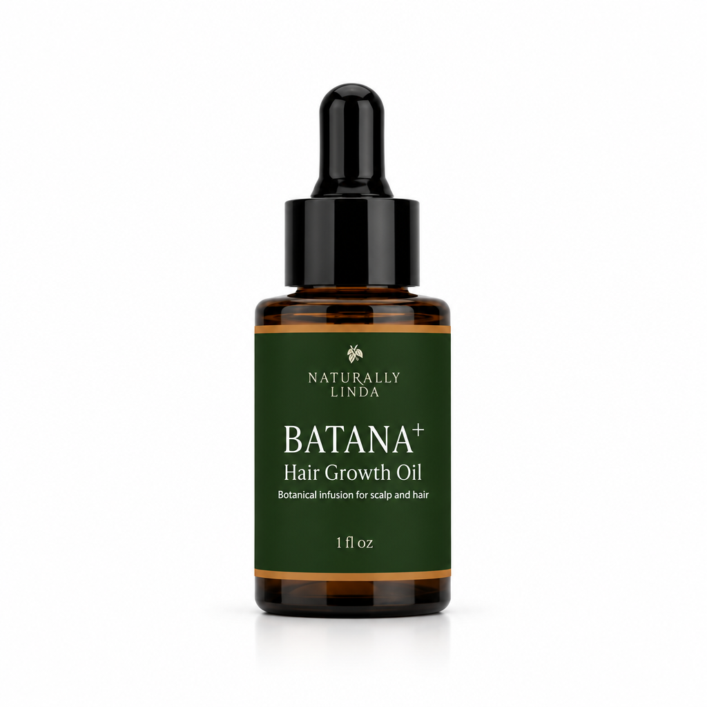 A 1 fl oz amber glass dropper bottle of Naturally Linda Batana+ Hair Growth Oil, featuring a dark green label with white text and a black dropper cap, set against a light gray background.