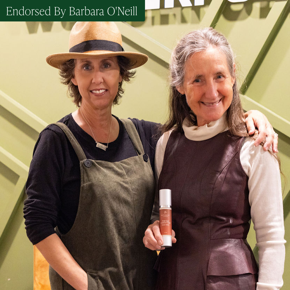 Linda and Barbara O'Neill standing together with a product, endorsed by Barbara O'Neill.
