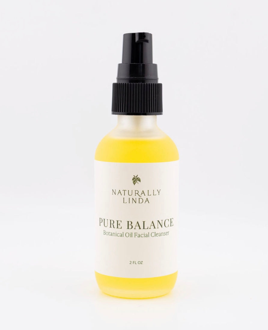 Bottle of Naturally Linda Pure Balance Botanical Oil Facial Cleanser on a white background