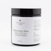 Naturally Linda Balancing Blue whipped tallow cream jar on a white background
