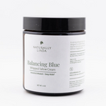 Naturally Linda Balancing Blue whipped tallow cream jar on a white background
